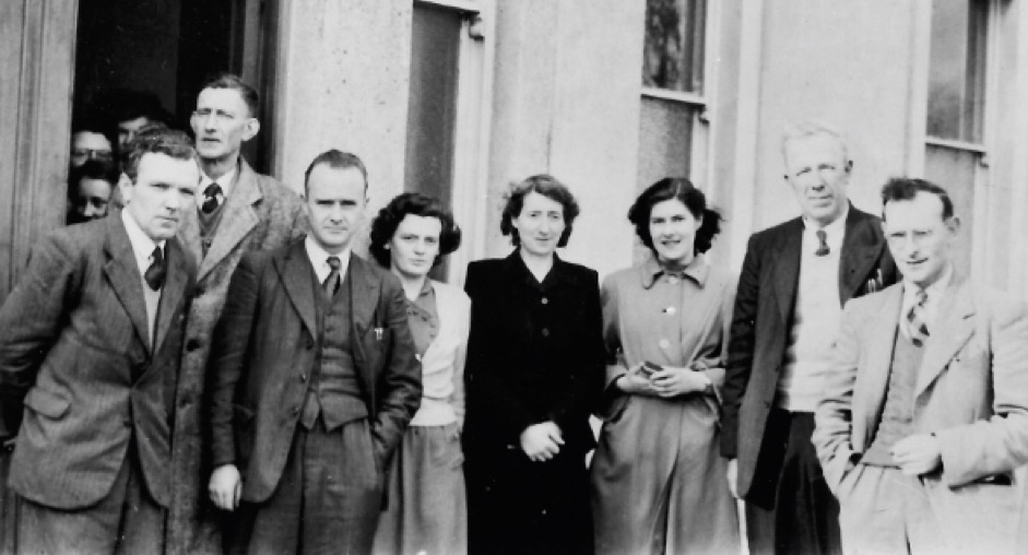 0011 : 1951, Left to Right: Mr. E. O’ Connell - Science teacher and Principal, Mr James J. O Carroll- Horticultural Advisor, Mr. P.J. Twomey - Woodwork, Mrs. P. Coughlan - Domestic Science, Ms. Irene Ryan - Commerce, Ms. M. Curley - student who came 1st place in Ireland in Advanced Irish and Silver Medalist, 1st place in Ireland in Advanced English and 1st place in Ireland in Elementary Book-Keeping, Mr. M. Moran - CEO and Mr. P. Collery – Irish teacher.