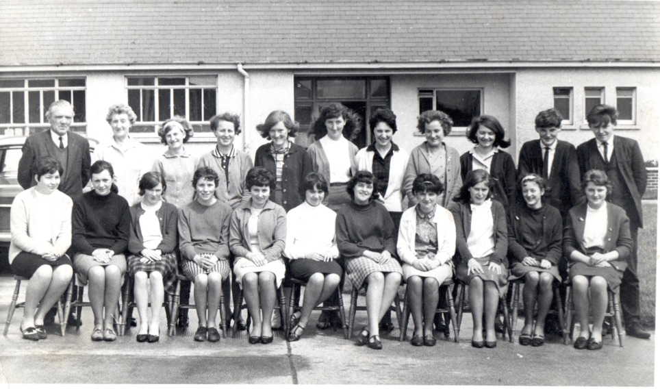 0029 : Back Row: Mr. O'Connell, Ms. Ryan, Patricia Power, Mary McAuliffe, Maria Maguire, Joan Nolan, Mary O’ Sullivan, Mary Behan, Cora Mackessy, Anthony Lenihan and Francis Hayden. Front Row: Mary O’ Connor, Mary Shine, Joan Flynn, Kathleen Ambrose, Mary Roche, Mary Riordan, Mary Downes, Betty O’ Connor, Mary O’ Sullivan, Gill Roche and Bridie Clifford.